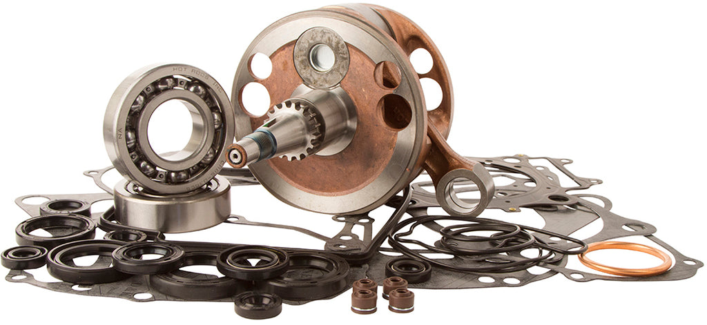 Hot Rods Bottom End Kit for engine, includes engine components, laid out on a workbench with tools and parts visible.