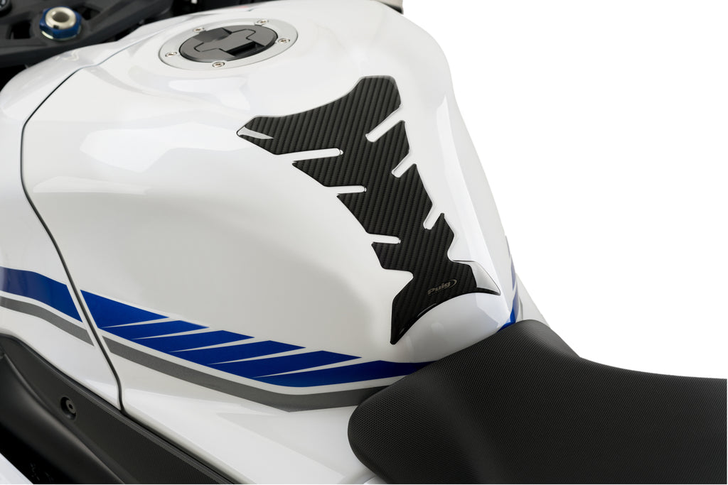 PUIG Performance Tank Pad Carbon for motorcycle body protection, featuring black carbon design and durable construction