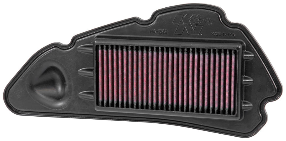 Close-up of a K&N Air Filter 731513, showing the clean, reusable cotton filter element with rubber edges for vehicle air filtration.