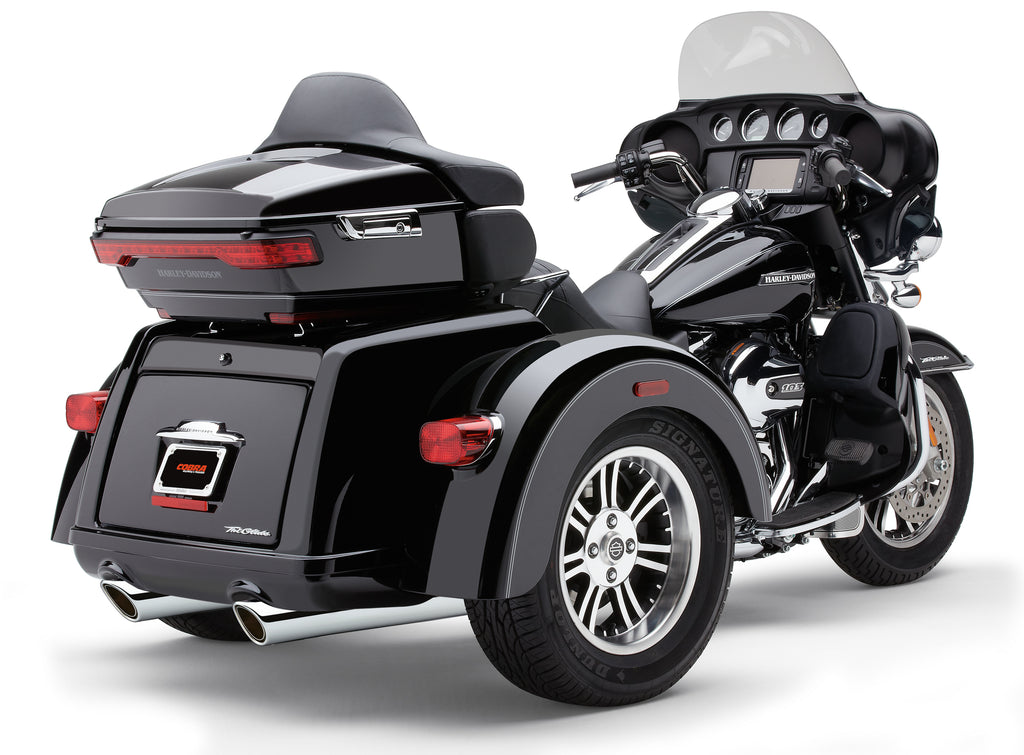 Chrome Cobra 909-Twins 4-inch slip-on exhaust with tri-glide design, for motorcycle exhaust system, shown from side angle.