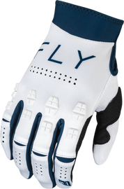 Fly Racing Evolution DST gloves in white and navy, showing the lightweight, padded motorcycle glove with branding and textured grip.