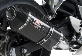 Yoshimura Street R-77 slip-on exhaust with stainless steel and carbon fiber components, designed for high-performance motorcycles.