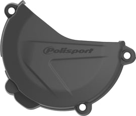 Polisport Plastics black clutch cover protector for motorcycles, part number 64-0736B, shown on a motorcycle engine.