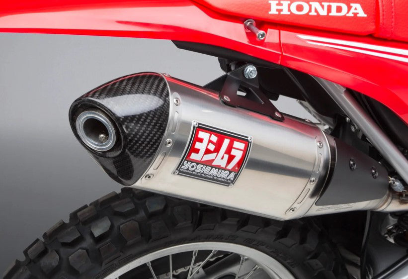 Yoshimura Race RS-4 slip-on exhaust for motorcycle, featuring stainless steel and carbon fiber components.