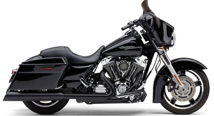 Cobra 4.5-inch black uppercut slip-on exhaust for Harley Flh and Flt models, featuring sleek metal finish and branding details
