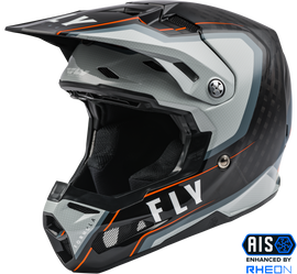 Fly Racing Formula Carbon Axon helmet in black, grey, and orange with aerodynamic design and ventilation for motocross riding.
