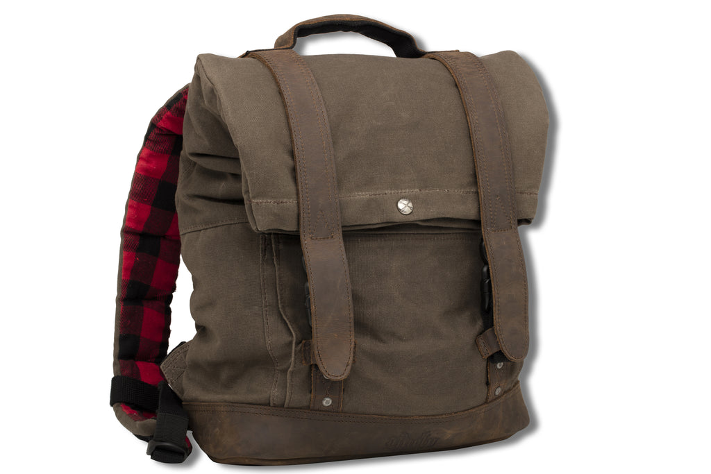 Dark oak Burly Brand backpack with multiple compartments and padded straps, designed for durable travel and everyday use.