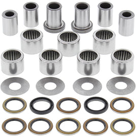 All Balls suspension linkage kit with bearings and seals, featuring multiple metal components and rubber seals arranged for installation.