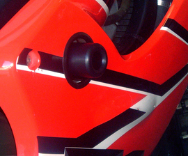 Black Shogun Industries Frame Sliders for motorcycle body protection, shown mounted on a bike frame.