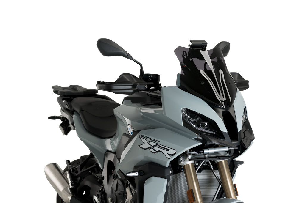 PUIG Sport Dark Smoke Windscreen for BMW motorcycle, showing tinted windshield with mounting edges and sleek aerodynamic design.
