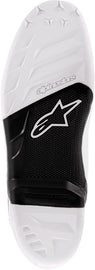 Alpine Star Tech-7 motocross boots in black and white, size 10, showing the sole and side profile.