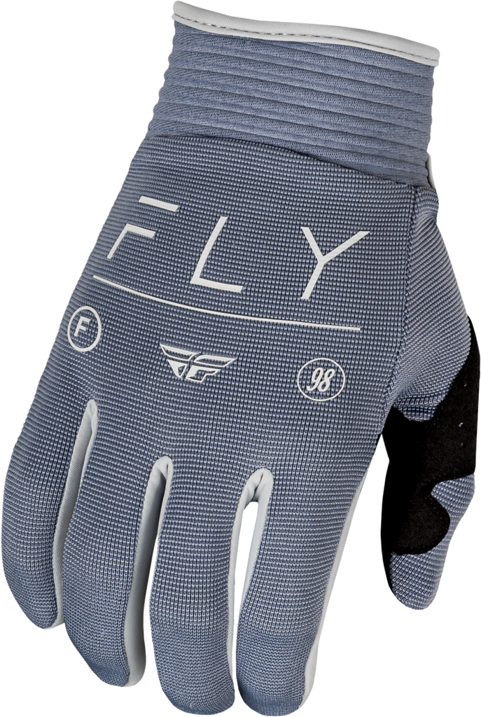 Fly Racing F-16 Gloves in Stone and Black, large size, showing close-up of textured fabric and secure wrist closure.