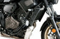 Black PUIG Frame Sliders Pro 2.0 guards for motorcycle, mounted on bike frame for protection and stability.