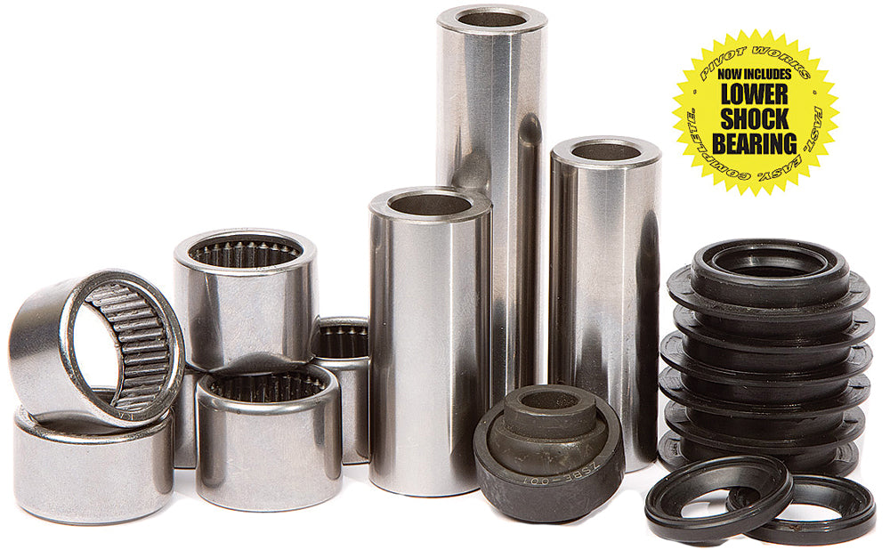 Pivot Works suspension linkage rebuild kit 52-03203 with metal components and bushings, designed for motorcycle suspension systems.