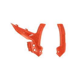 Acerbis X-Grip KTM orange frame guard installed on motorcycle frame, showcasing durable protective material and vibrant orange color.