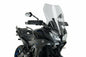 Clear PUIG touring windshield mounted on a motorcycle, providing wind protection with a sleek, aerodynamic design.