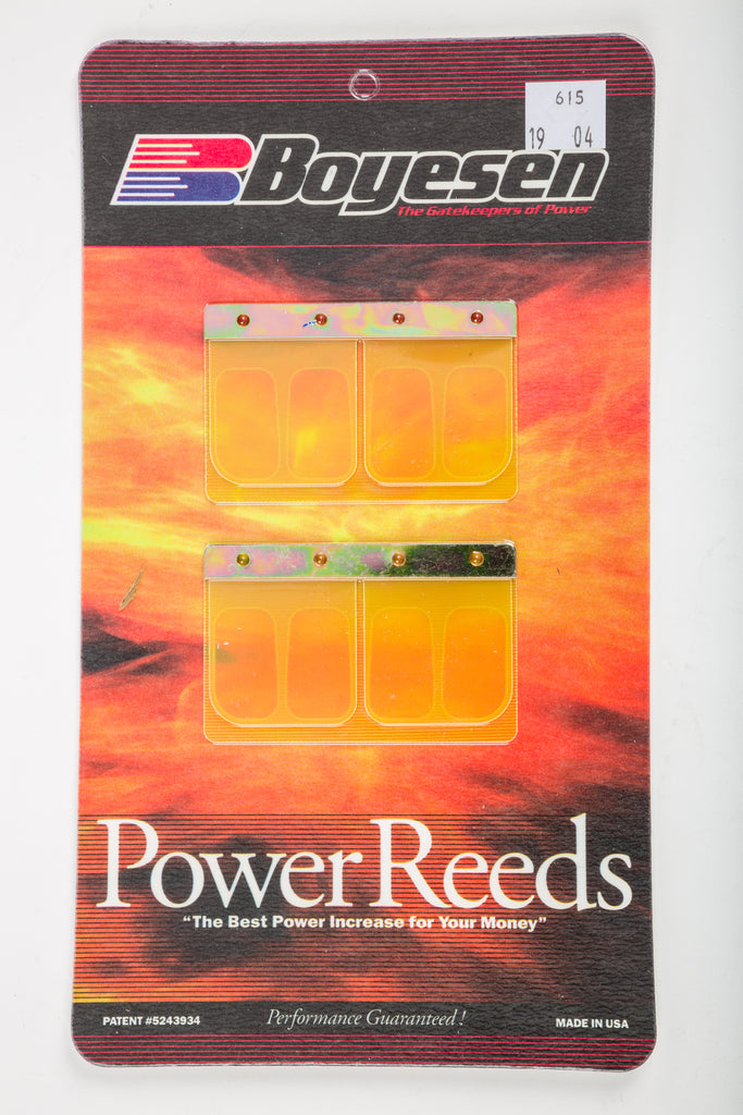 Boyesen motorcycle reeds 59-7615 for intake and carburetor fuel system, with metal and rubber components visible.