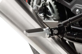 PUIG Sport Silver Footpegs for motorcycles, featuring sturdy metal construction and a textured surface for grip.