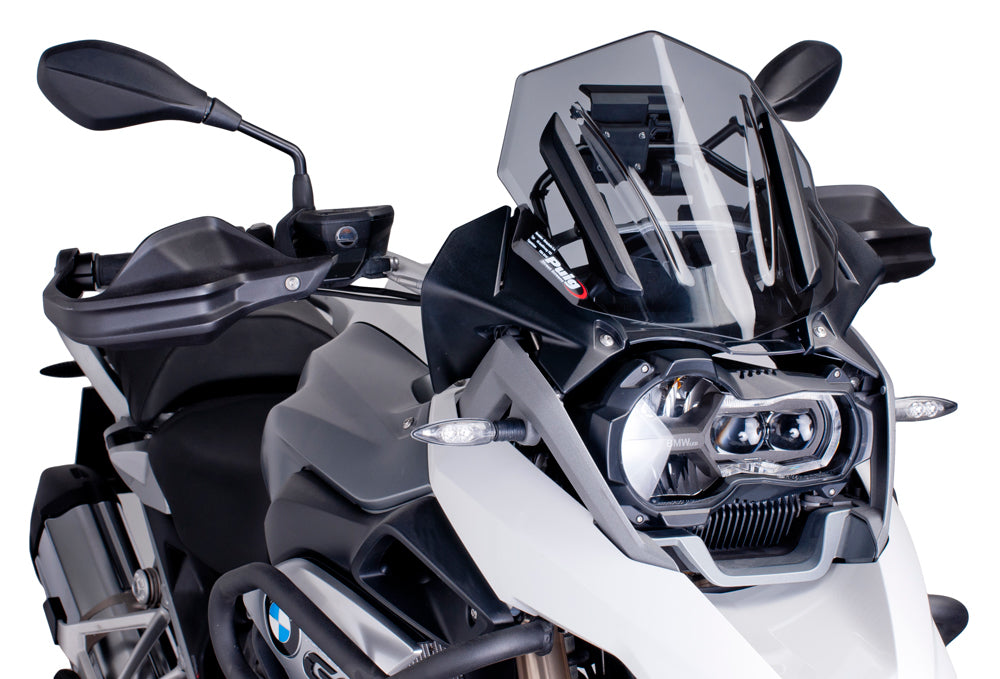 PUIG Racing Light Windscreen for motorcycle, clear windshield with aerodynamic design, mounted on bike with racing style.