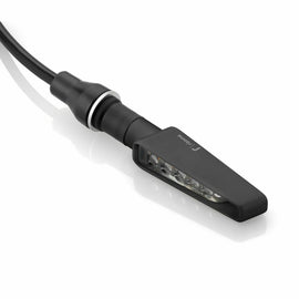 Pair of RIZOMA Vision Sequential Black turn signal lights for motorcycles, featuring sleek black housing and LED indicators.