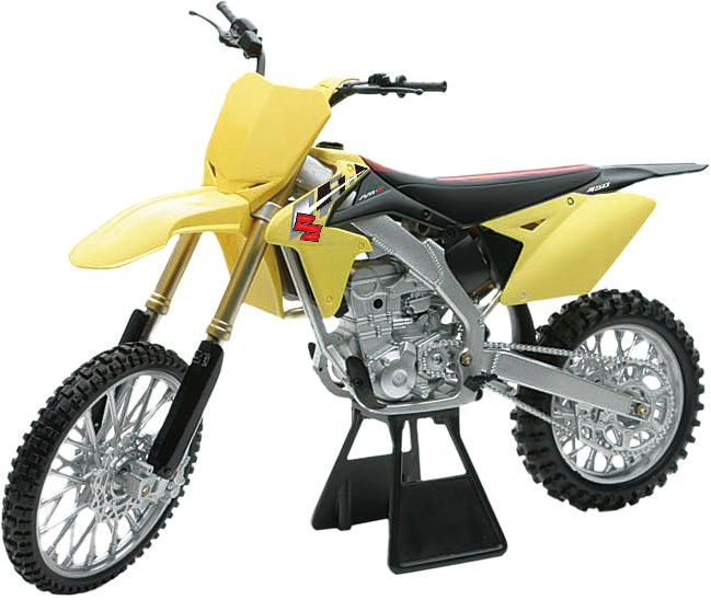 Yellow Suzuki RMZ450 1:6 scale race bike replica by New Ray Toys, detailed motorcycle accessory for collectors.