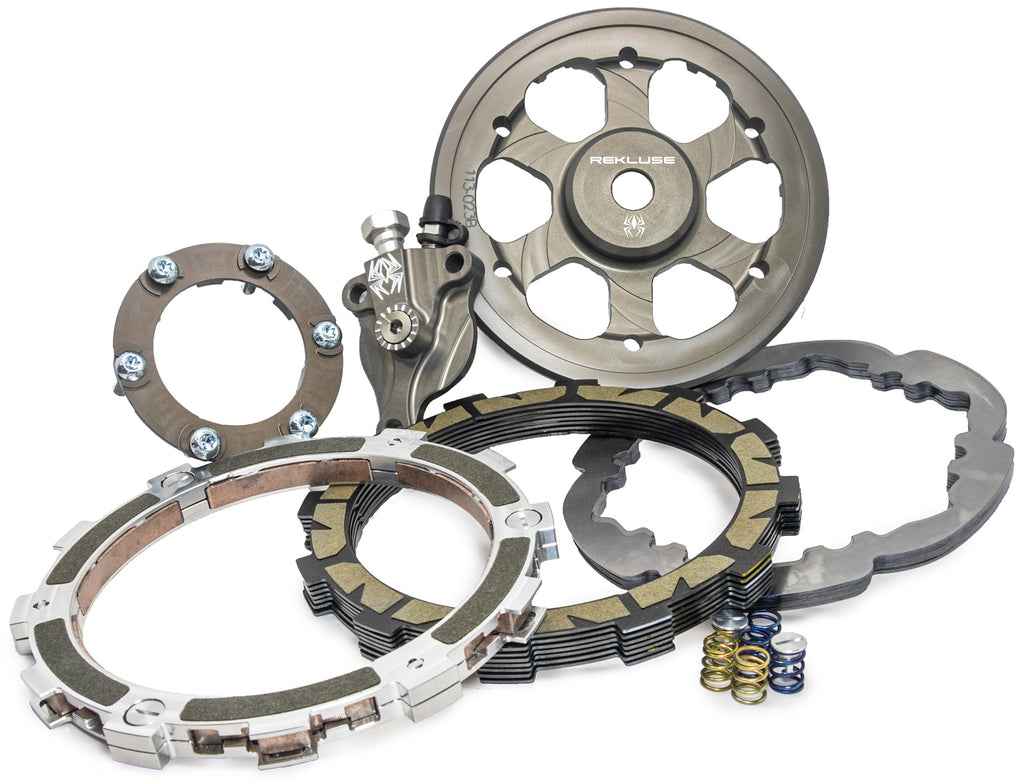Rekluse Radius X clutch for Berg, Husqvarna, KTM motorcycles, showing the black metal clutch component with detailed surface features.