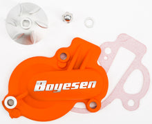 Load image into Gallery viewer, Boyesen water pump cover and impeller kit in orange, designed for ATV or motorcycle engine cooling systems.