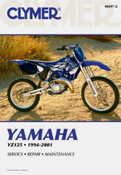 Clymer repair manual for Yamaha YZ125 motorcycle, showing detailed pages and diagrams for maintenance and repair.