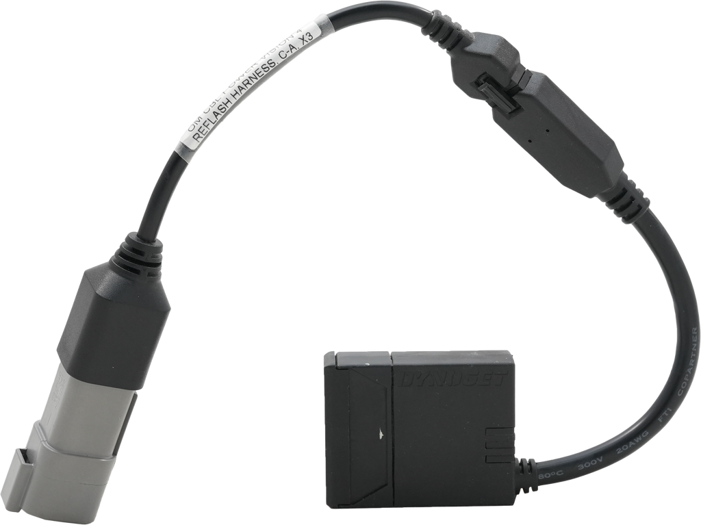 Dynojet Research Power Vision 4 engine management canister with control unit and wiring for motorcycle tuning.