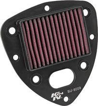 Load image into Gallery viewer, K&amp;N Air Filter 768009 showing a close-up of the reusable cotton air filter element with metal frame in a clean engine bay