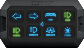 XK Glow XKcommand switch panel with illumination, featuring multiple toggle switches and indicator lights for vehicle lighting control.