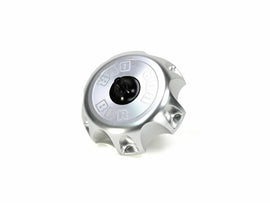 bbr Billet Gas Cap for Kawasaki motorcycles, shiny metal finish, detailed design, and secure locking mechanism.