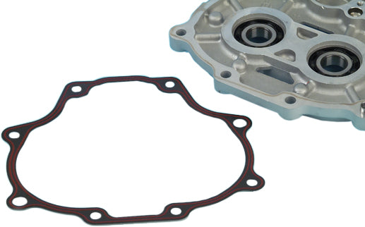 James Gasket gasket bearing cover for RCM twin cam 6-speed, showing the black rubber seal and metal housing in close-up.