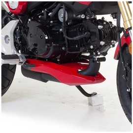 Unpainted Hotbodies Racing Grom body part lower fairing with smooth curves and mounting points, designed for motorcycle customization.