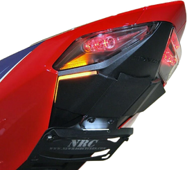 New Rage Cycles Fender Eliminator tucked body kit for motorcycle, showcasing sleek design and mounting hardware.