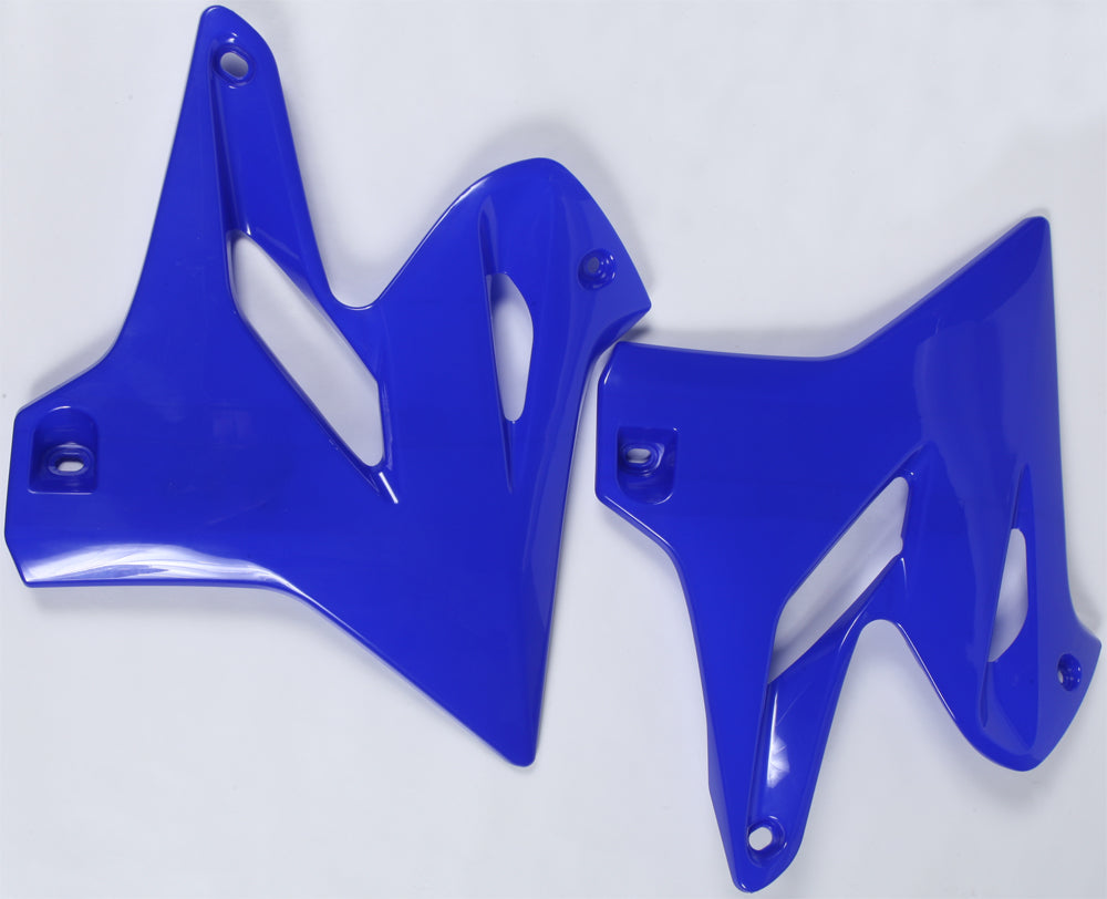 Blue Polisport Plastics radiator shroud body for ATV or motorcycle, featuring a sleek design and mounting points.