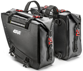 GIVI GRT718 waterproof saddle bags with 15L capacity, mounted on motorcycle luggage rack, black durable textile material.