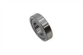 Peer Bearing drive line inner primary cover bearing installed on motorcycle engine component, close-up view of the bearing and cover.