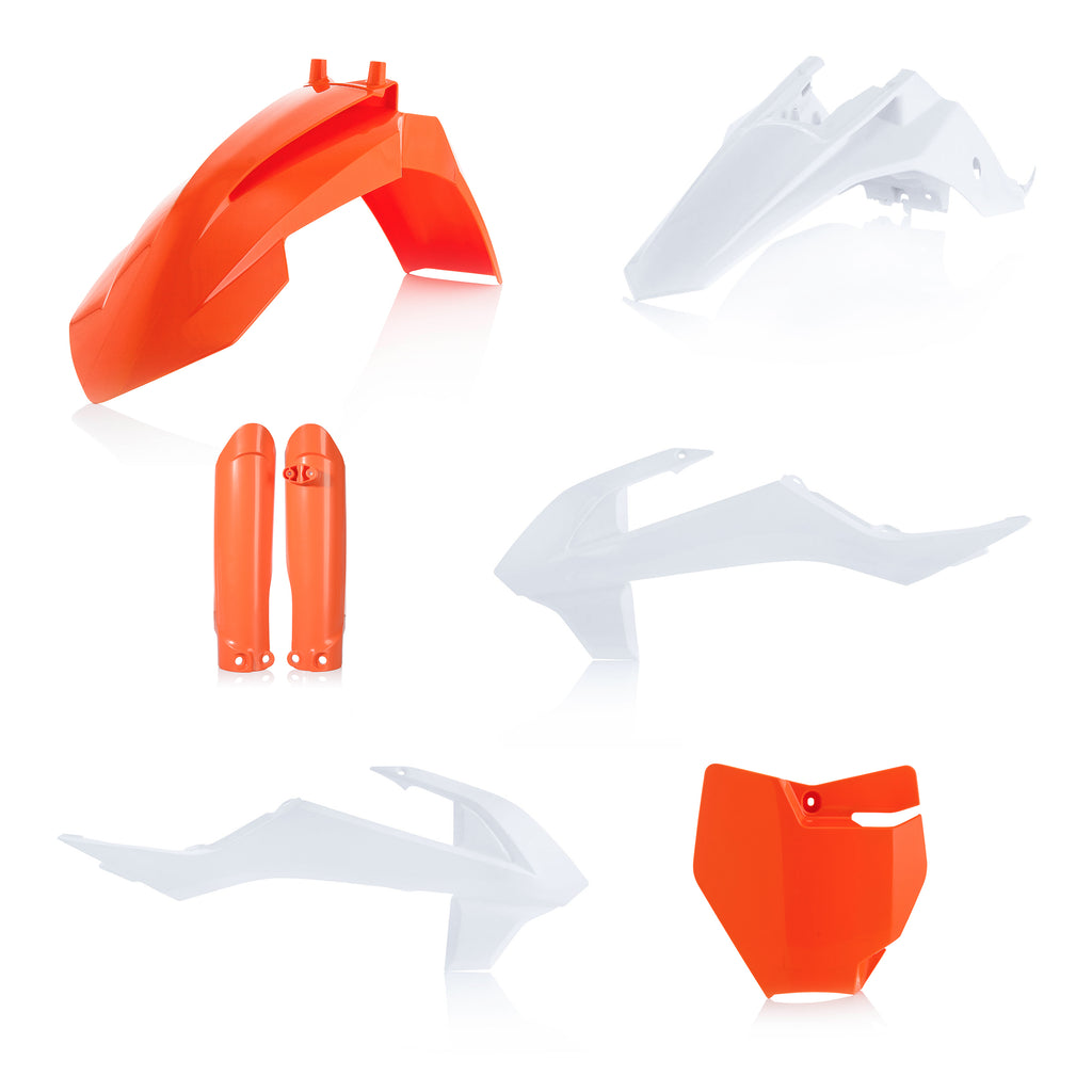 Acerbis full plastic kit for KTM motorcycle, showing various colored plastic panels and parts laid out on a white background.