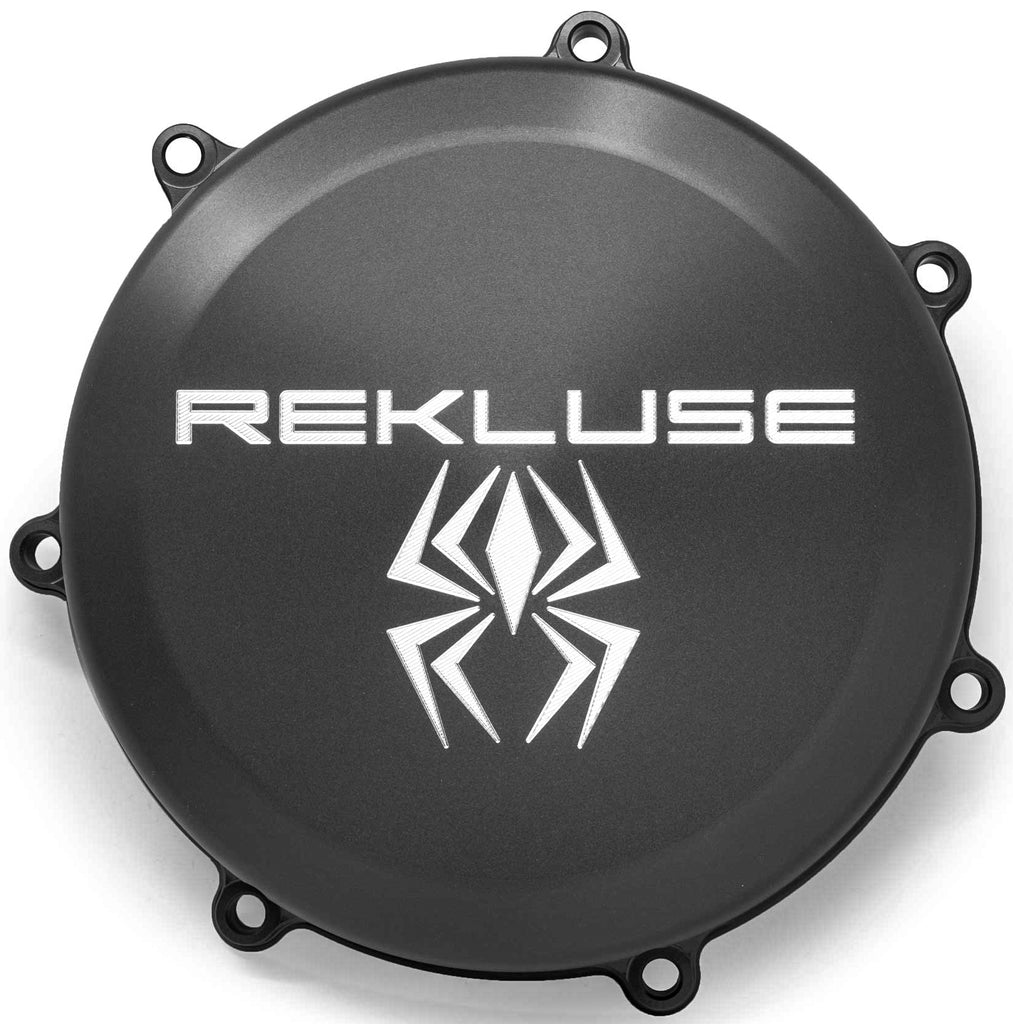Rekluse clutch cover for KTM motorcycle, durable metallic finish, detailed close-up showing brand logo and mounting features
