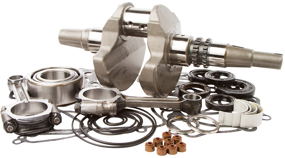 Hot Rods Bottom End Kit 421-0178 engine components including crankshaft, pistons, and connecting rods on a workbench.