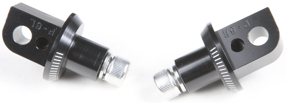 PUIG footpeg adapter for motorcycle foot controls, black metal with mounting hardware visible in the image.