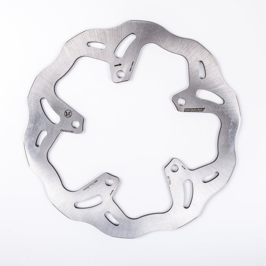 Front braking racing rotor by Braking, showing a metallic disc with vented design for high-performance vehicle braking.