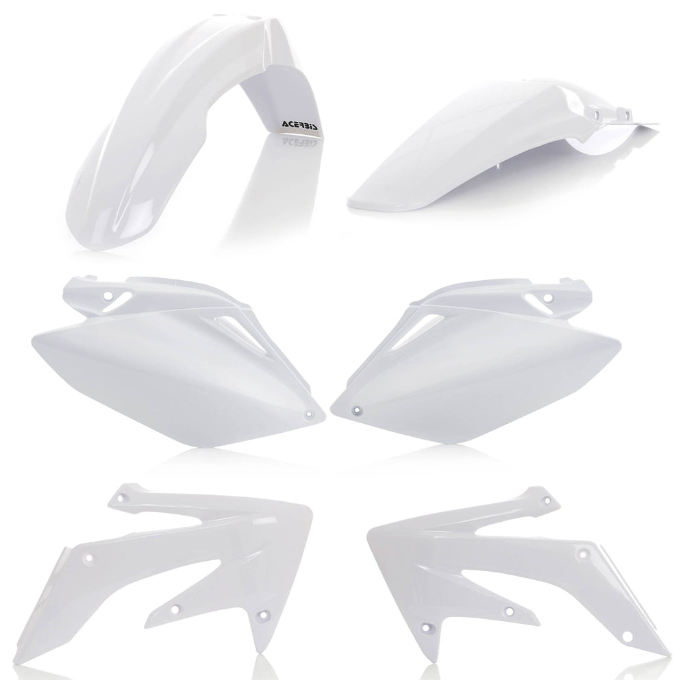 Acerbis white plastic kit for motorcycle, showing various panels and parts assembled on a flat surface.