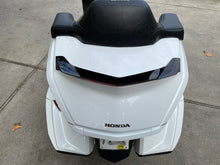 Load image into Gallery viewer, Pathfinder rear spoiler with black finish and LED lights, featuring dynamic sequential illumination on a vehicle.