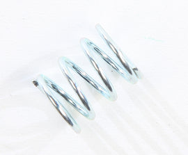 Mikuni Spring Throttle Stop for TM 13-2112, used in intake and carb fuel systems, shown on a motorcycle engine component