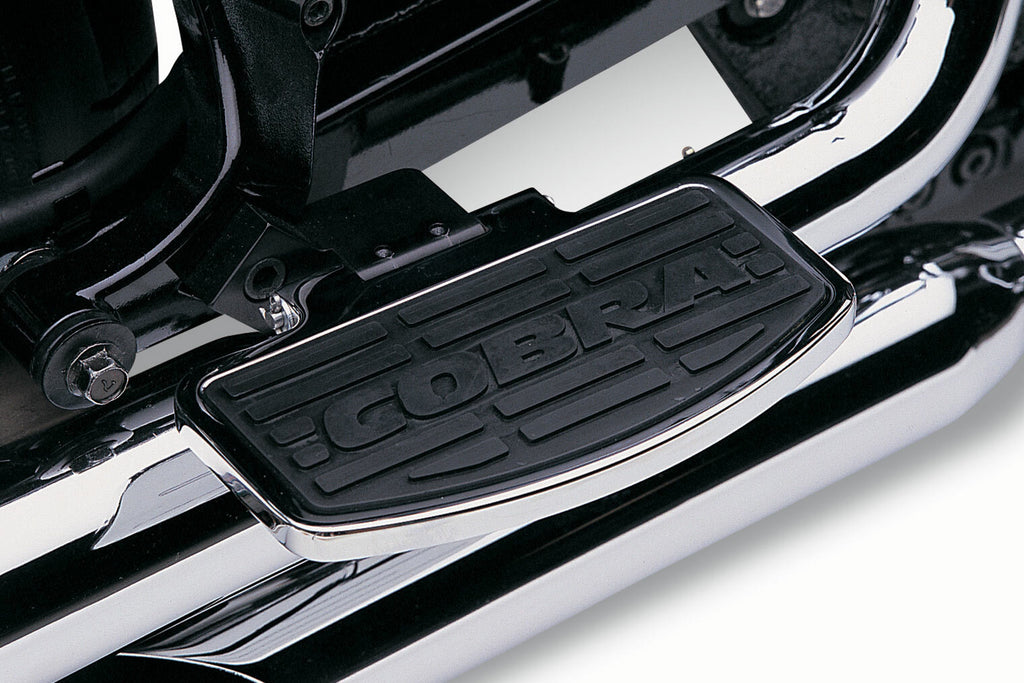 Cobra passenger floorboards for Honda VTX1300C motorcycle, showing black foot controls with textured surface and mounting hardware.