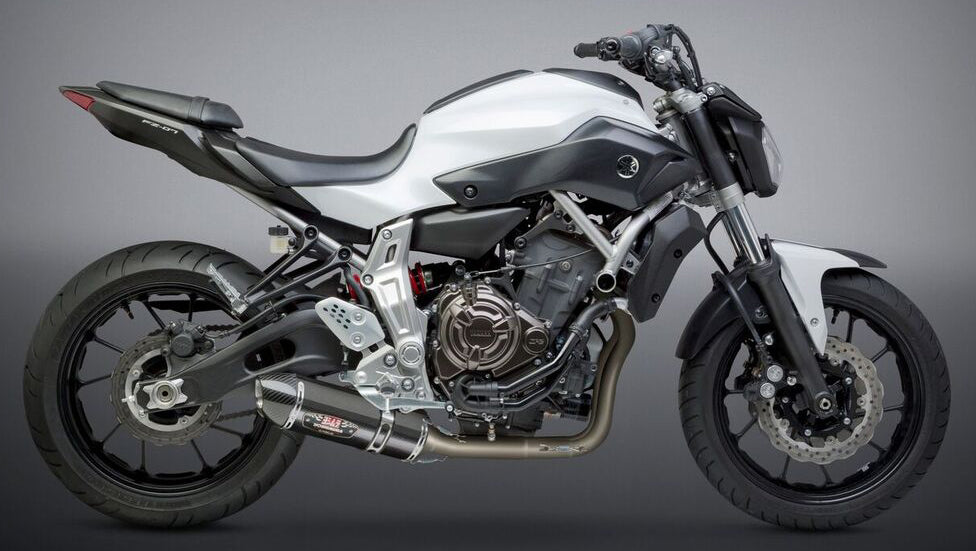 Yoshimura Race R-77 full exhaust system with stainless steel and carbon fiber components for motorcycle performance.