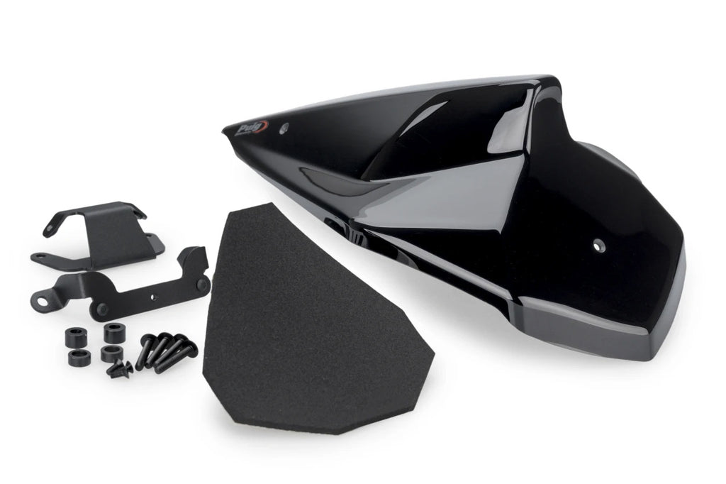 Black PUIG rear seat cowl for Kawasaki motorcycle, showing the sleek body design and textured surface in close-up view.