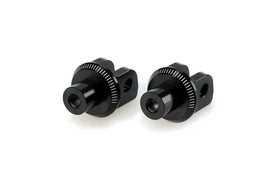 Black PUIG footpeg adapter for BMW motorcycle, part of foot controls, shown on a bike in the image.